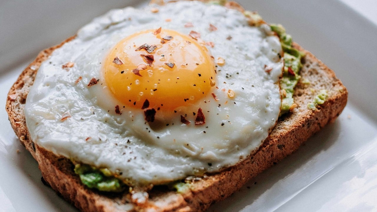 Avocado toast with a fried egg on top