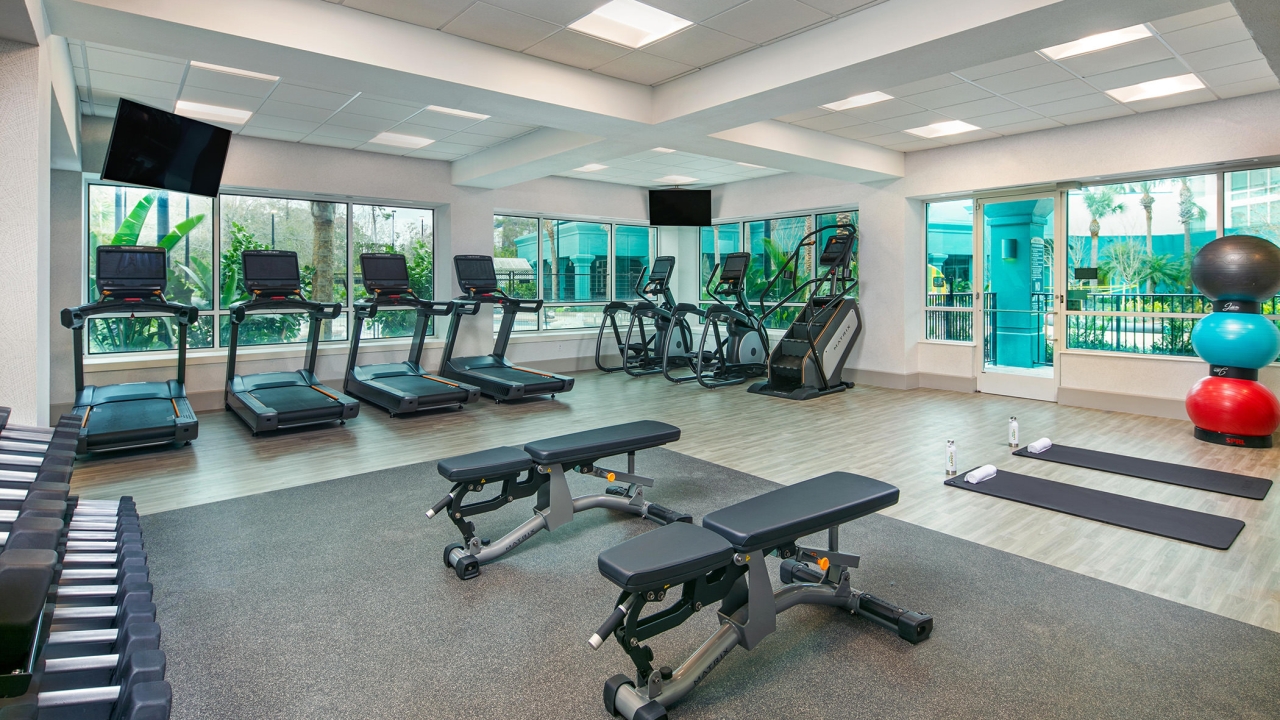 The fitness room at Hotel Landy with exercise equipment