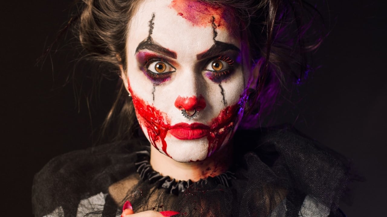 a woman in scary halloween makeup
