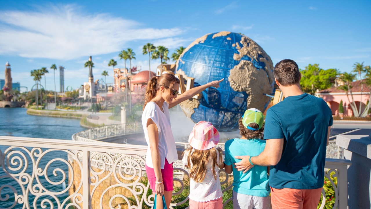 A family looking at the Universal Globe