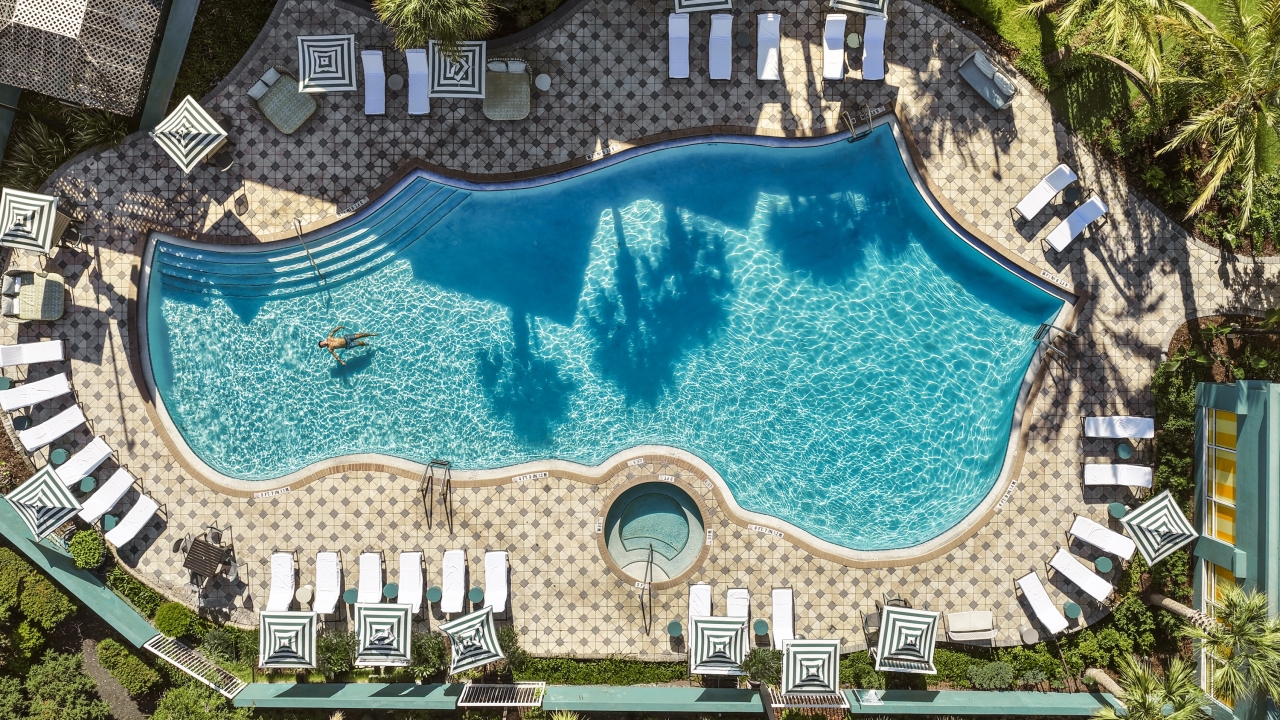 Aerial, top-down-view of the Hotel Landy Pool